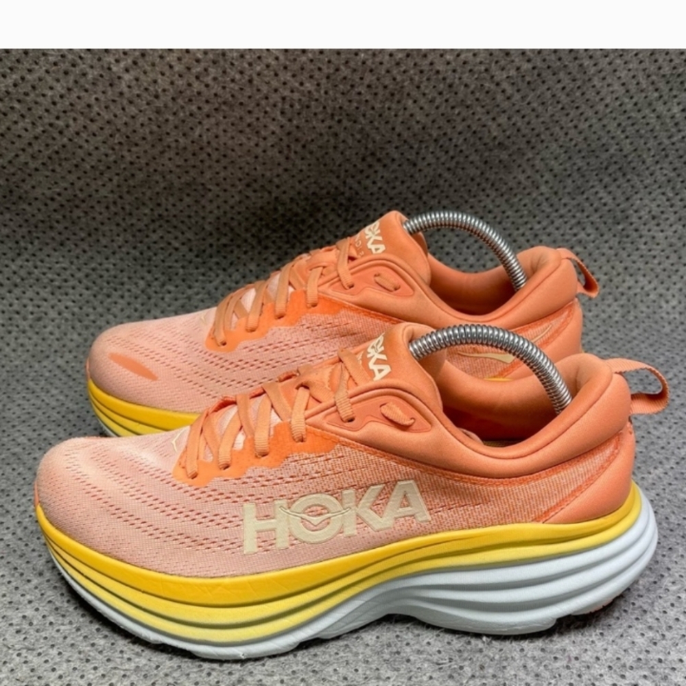 Hoka Orange and Yellow Athletic Shoes with Maximalist Cushioning